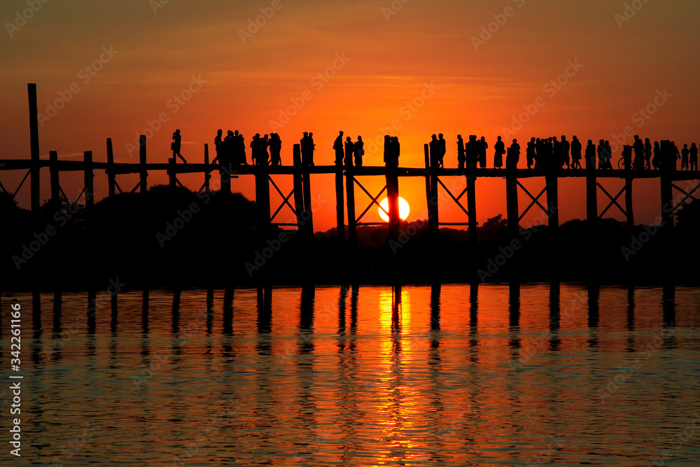 Silhouette of U bein bridge at sunset Amarapura ,Mandalay, Myanmar.