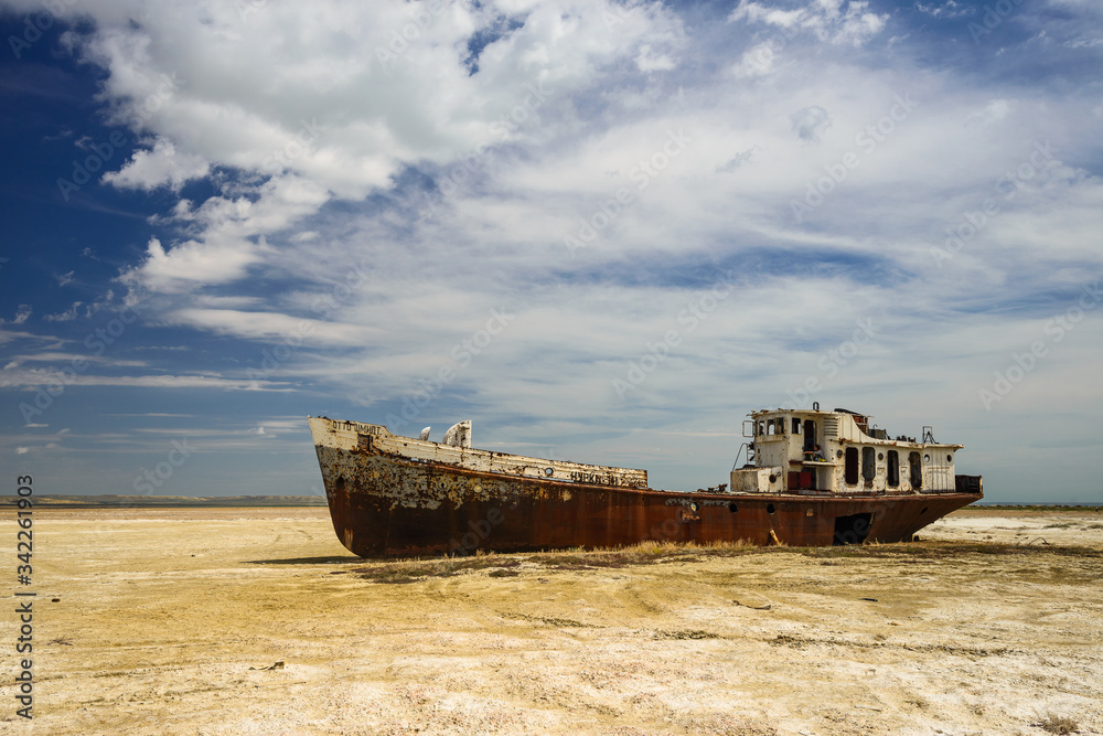 Old fishing schooner at the bottom of the dried Aral Sea