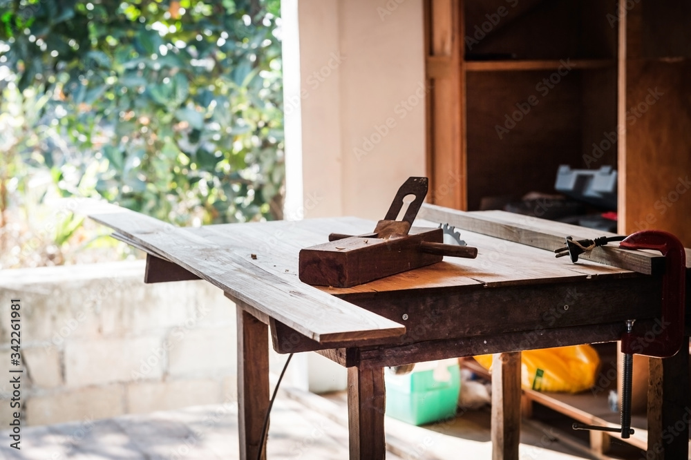 closeup of table and carpenter tool closeup of table and carpenter tool