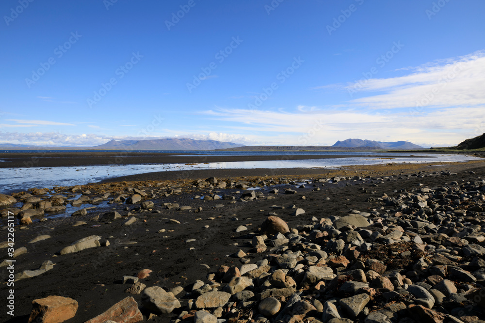 Vatnsnes / Iceland - August 27, 2017: A volcanic beach in Vatnsnes peninsula, Iceland, Europe Vatnsnes / Iceland - August 27, 2017: A volcanic beach in Vatnsnes peninsula, Iceland, Europe
