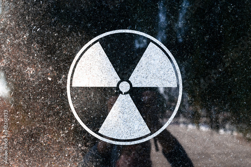 radioactive energy symbol on the concrete stone. Memorial in Tiraspol for those affected in Chernobyl. photo