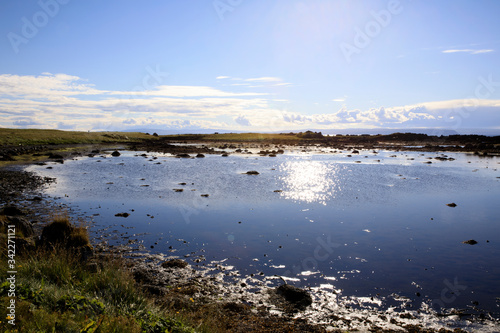 Fototapeta Naklejka Na Ścianę i Meble -  Vatnsnes / Iceland - August 27, 2017: The coast and the sea in Vatnsnes peninsula, Iceland, Europe