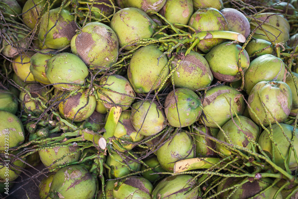 Fototapeta premium coconut fruit stack closeup for background