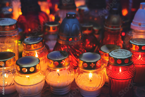 Candles on a grave at night