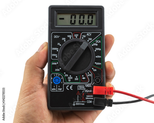 Digital multimeter on white background