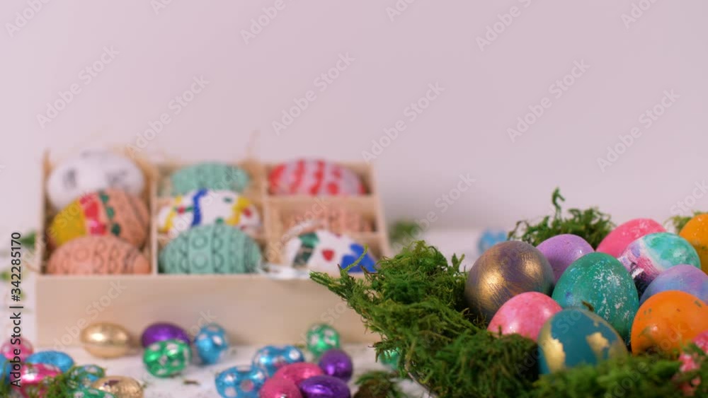 Colourful Eggs Spinning with Easter Eggs Background