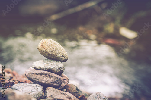 Photography zen basalt stones and waterfall in forest