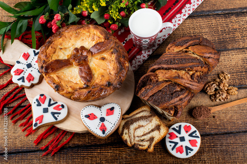 Cozonac or Kozunak is a special sweet leavened bread, Romania and Bulgaria. Martisor, 1 Martie, 1st of March, 8th of March, Woman's Day, Mother's Day, Martenitsa and Baba Marta celebration photo