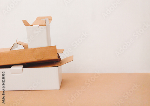 Vászonkép photo of waste paper and plastic, pile of cardboards for recycling, copyspace for text