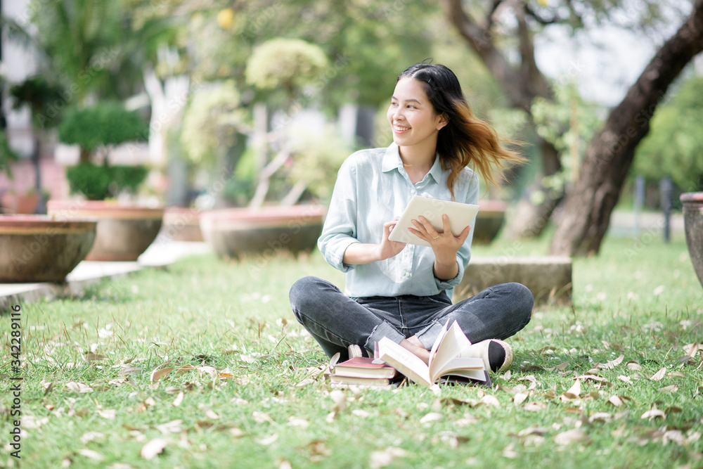 Happy young Asian University student. Happy young Asian University student.