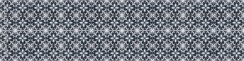 Dark blue gray white vintage retro geometric square mosaic motif cement tiles with flower blossom print texture background banner panorama
