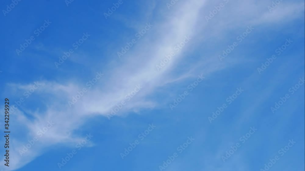 moving white cloud with blue sky background at day time moving white cloud with blue sky background at day time