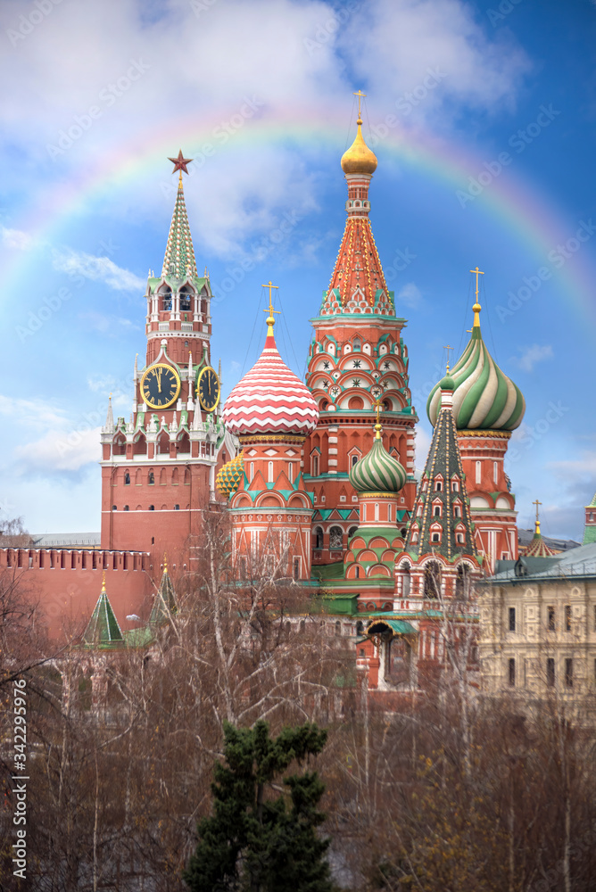 Saint Basil's Cathedral and Kremlin in Moscow, Russia known as The Cathedral of Vasily the Blessed, is a Russian Orthodox church on Red Square. Blue sky with a rainbow 