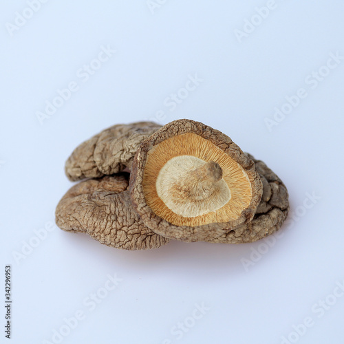 Isolated and close up dried shiitake mushroom ,element of food healthy nutrients concept on white background.
