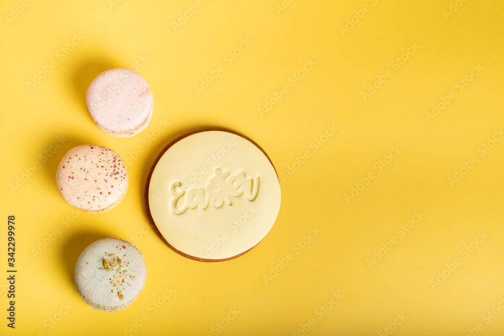 Macaroons isolated on yellow background Macaroons isolated on yellow background