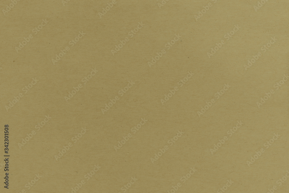 Close-up texture of yellow crepe corrugated blotting paper for DIY. Concept of choice. Soft focus, high contrast, horizontal background shot Close-up texture of yellow crepe corrugated blotting paper for DIY. Concept of choice. Soft focus, high contrast, horizontal background shot
