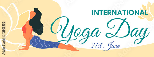 International yoga day - June 21 - horizontal banner with a woman doing yoga. Cobra pose, bhujangasana asana. Yoga instructor. Physical activity as a way to relieve stress. Physical and mental health.