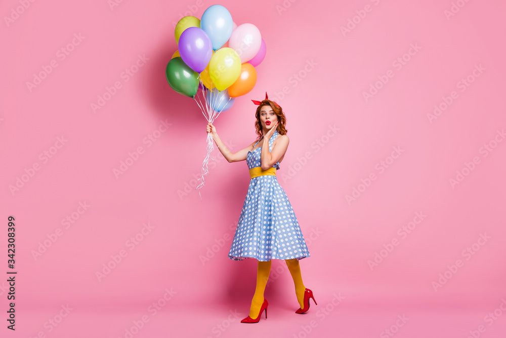 Full size photo crazy astonished girl hear wonderful sales novelty touch hands face scream wow stare hold baloons she get gift wear look elegant outfit stockings isolated pink color background Full size photo crazy astonished girl hear wonderful sales novelty touch hands face scream wow stare hold baloons she get gift wear look elegant outfit stockings isolated pink color background