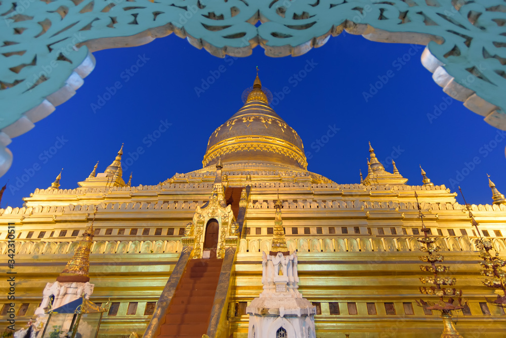 Golden pagoda at Shwezigon the temple of Myanmar in the evening Golden pagoda at Shwezigon the temple of Myanmar in the evening