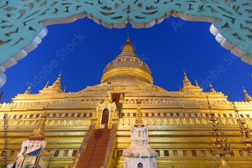 Golden pagoda at Shwezigon the temple of Myanmar in the evening © anake