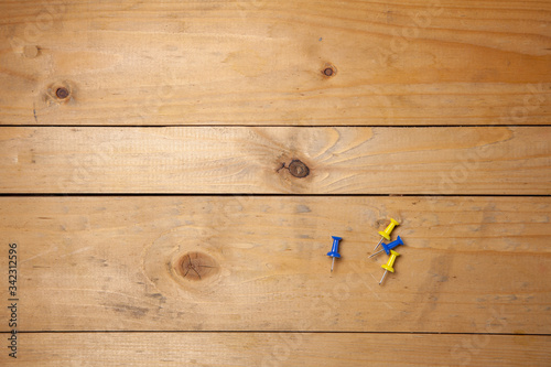 Nails placed on a wooden table