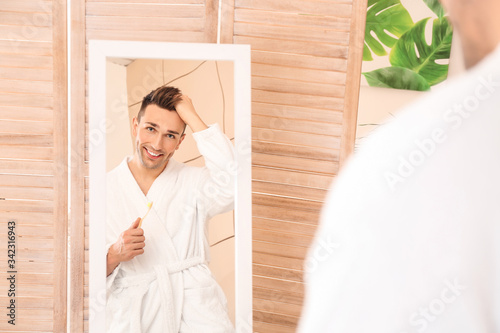 Handsome young man with too...