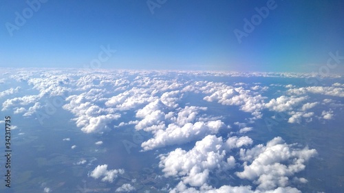 Clouds and sky- Top view from airplane. © Hyder