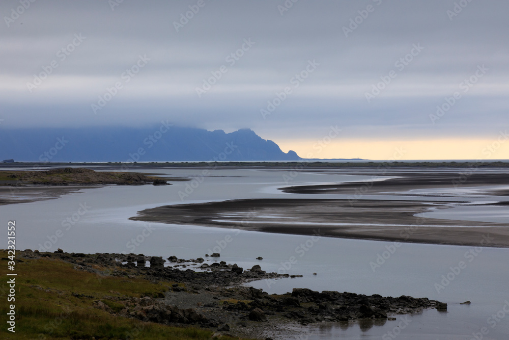 Iceland - August 29, 2017: Typical northern light and the sea near the Ring Road, Iceland, Europe