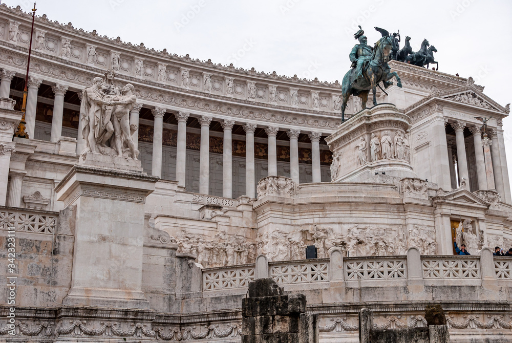 Rome Italy. View of the Vittoriano, also called the altar of the fatherland. Detail on sculpture the concord and on statue of King 