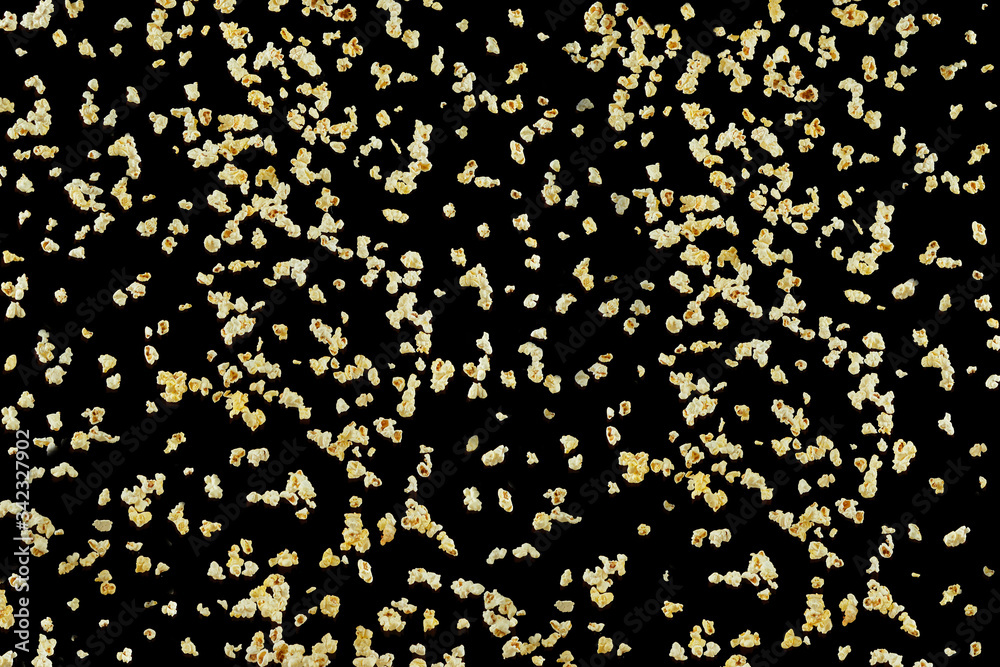 Flying prepared popcorn isolated on the black background, Flying prepared popcorn isolated on the black background,