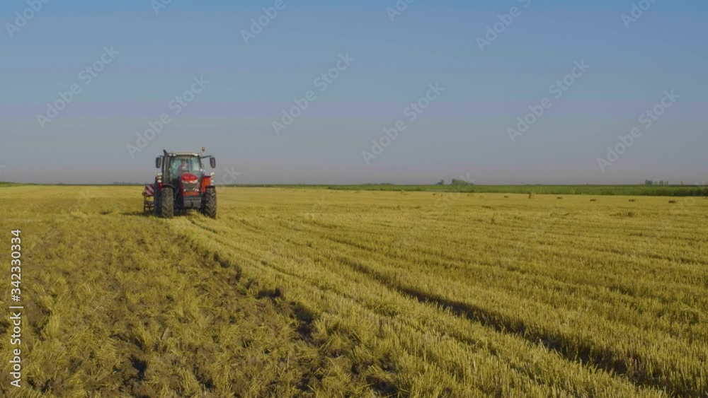 tractor in the field for tillage and cultivation tractor in the field for tillage and cultivation