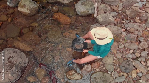 Wallpaper Mural Fossicking for gold in a creek Torontodigital.ca