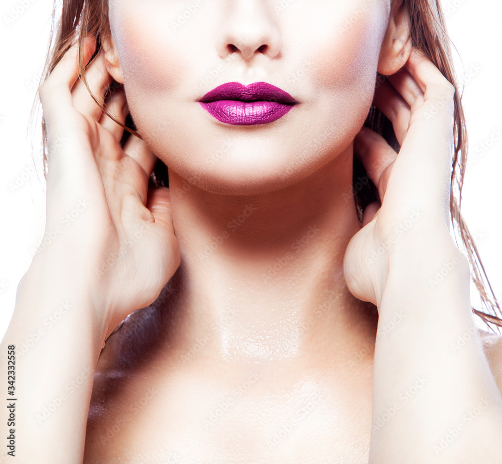Fototapeta premium Purple lips. Part of face of beauty model woman and beautiful neck. Bright make-up, clean fresh skin. Isolated over white background