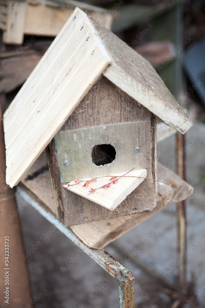 Homemade birdhouse on   street