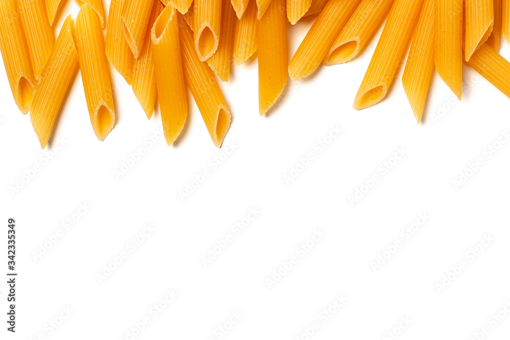 Fototapeta premium Penne pasta isolated with copy space. Raw macaroni isolated on white background.