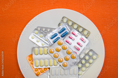 Pills and capsules with fork - food, protection quarantine, coronavirus, covid19