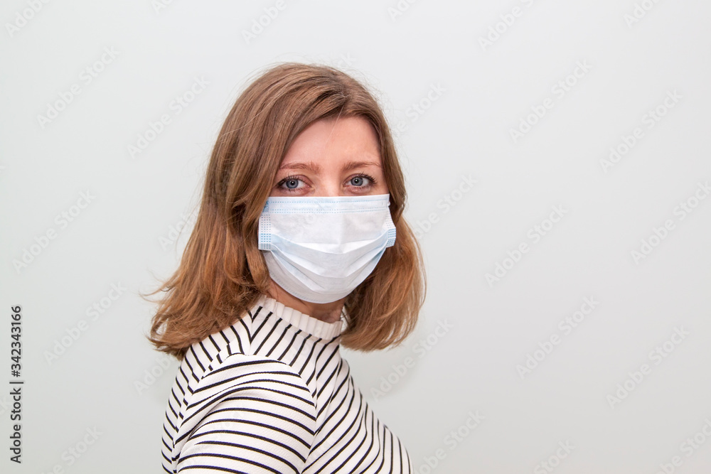 woman wearing an anti-virus protection mask to prevent flu infection, allergies, virus protection, COVID-19, and corona virus pandemic disease 2019 woman wearing an anti-virus protection mask to prevent flu infection, allergies, virus protection, COVID-19, and corona virus pandemic disease 2019