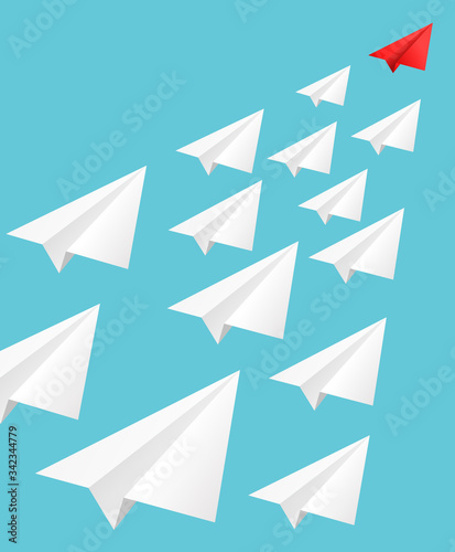Leading red paper airplane flies ahead of white planes aimed at common goal.  Influencer, KOL, key opinion leadership concept.