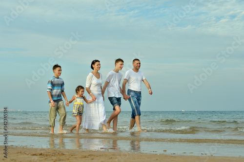 Portrait of family at beach in summer
