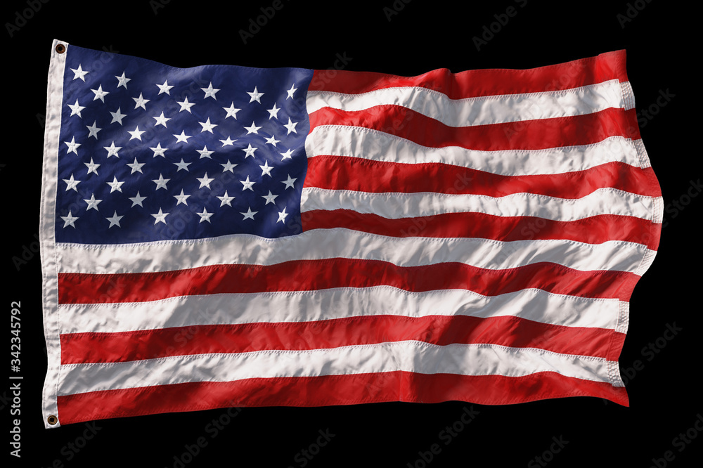 Fototapeta premium American flag waving in the wind isolated on black background. 3D
