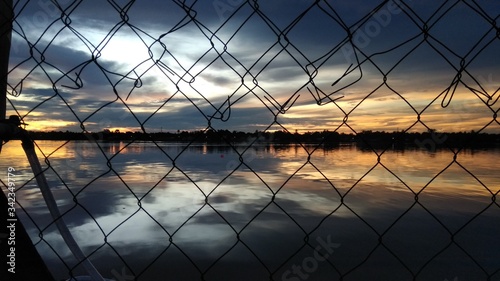 sunset on the fence