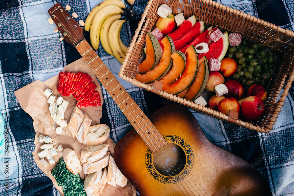 fruits and guitar on a picnic