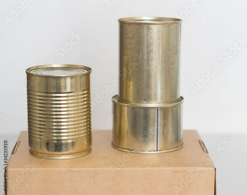 tin cans on a craft box