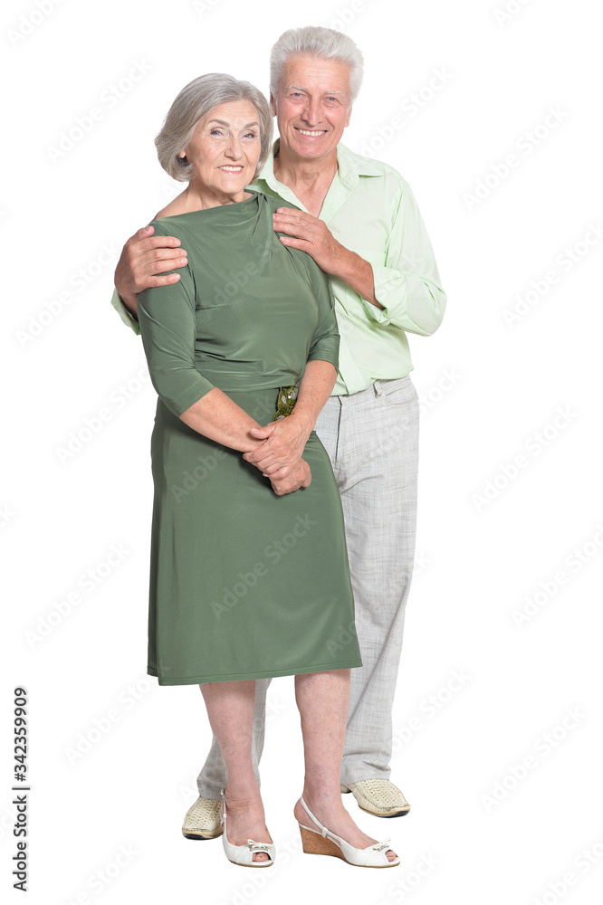 Portrait of beautiful senior couple hugging on white background Portrait of beautiful senior couple hugging on white background