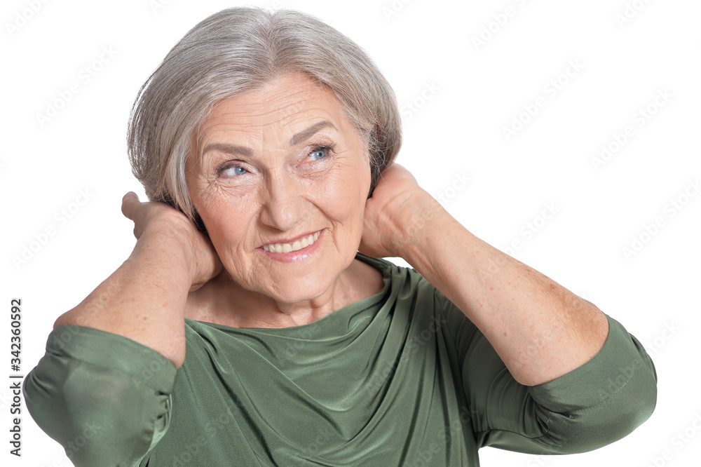 Close up portrait of beautiful senior woman on white background