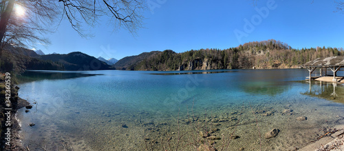 Panoramic view of the Alpsee lake on a sunny day near Neuschwanstein castle. Schwangau, Bavaria, Germany