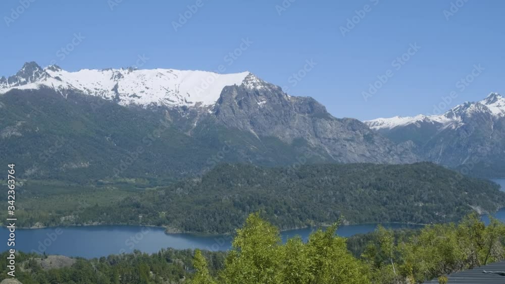 Track right from high angle hilltop view of Cerro Goye, Bella Vista and Lopez Mountains from the top of Cerro Campanario viewpoint in San Carlos de Bariloche, Patagonia, Argentina Track right from high angle hilltop view of Cerro Goye, Bella Vista and Lopez Mountains from the top of Cerro Campanario viewpoint in San Carlos de Bariloche, Patagonia, Argentina