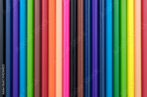 Colored pencils isolated in line on white background