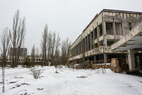 Wallpaper Mural Abandoned ghost town Prypiat. Overgrown trees and collapsing buildings. Pripyat, Chornobyl exclusion zone. December 2016 Torontodigital.ca