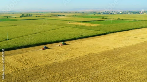 aerial view of tractor in field photo